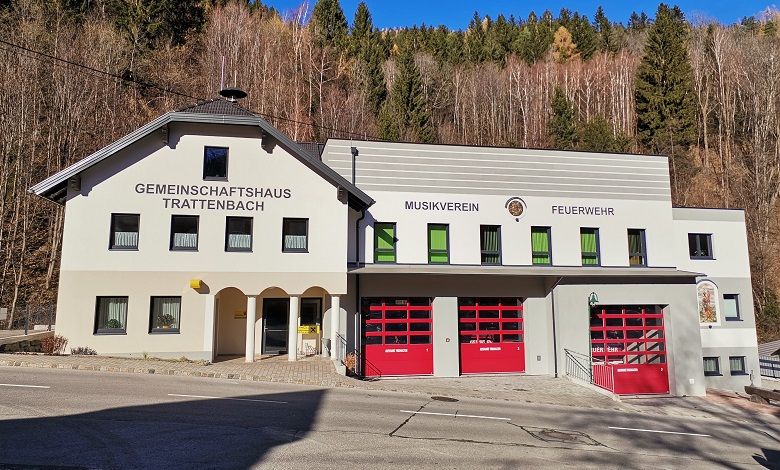 The Trattenbach community center with music club and fire department, surrounded by forest.