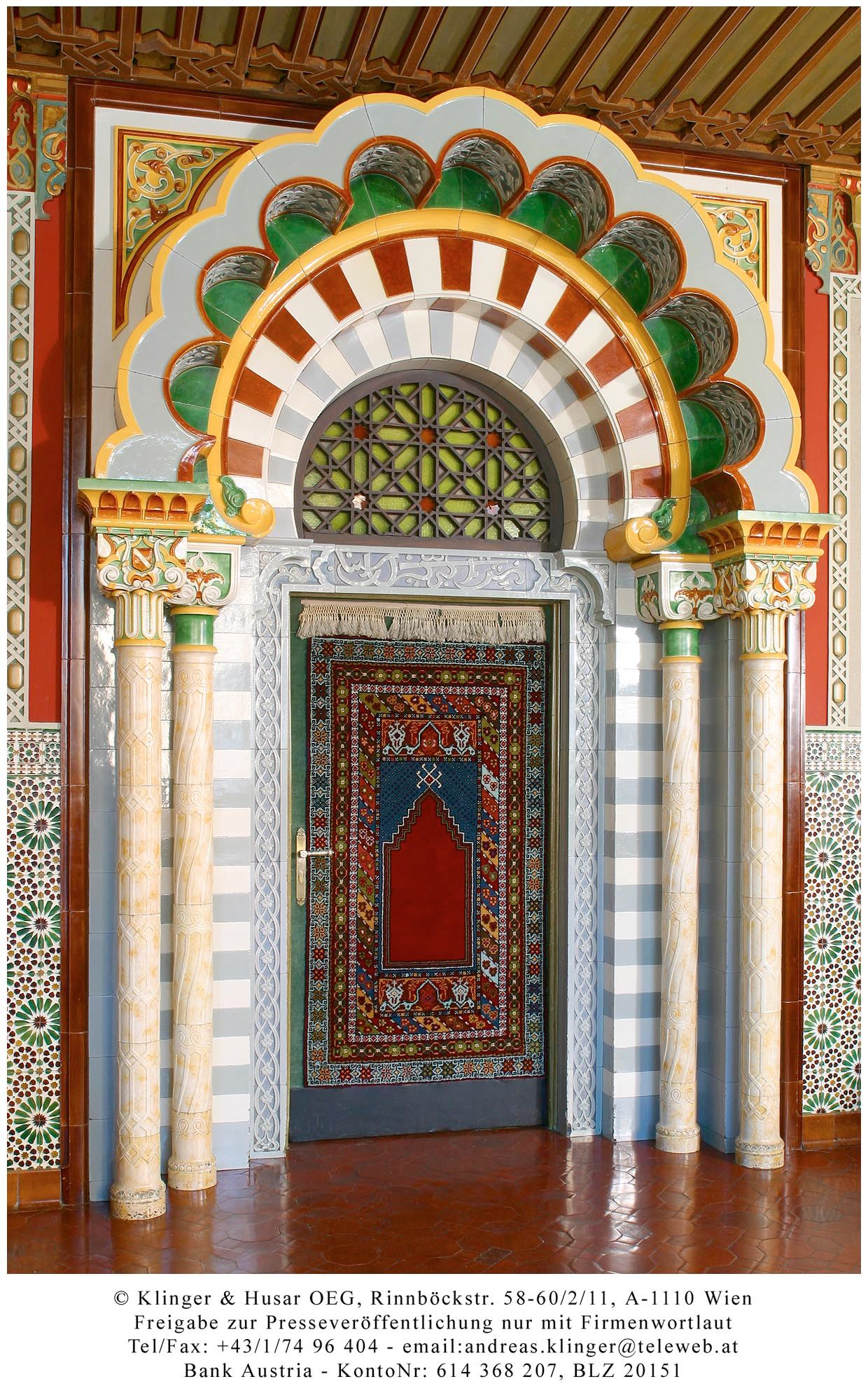 Decorative door with oriental patterns and columns.