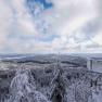 Snow-covered landscape with a viewpoint on the Nebelstein.