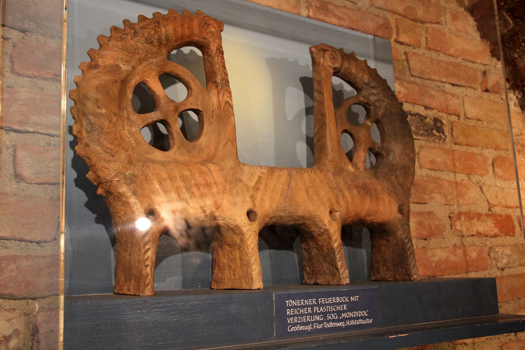 Clay fire trestle with decorations in the Stockerau District Museum.