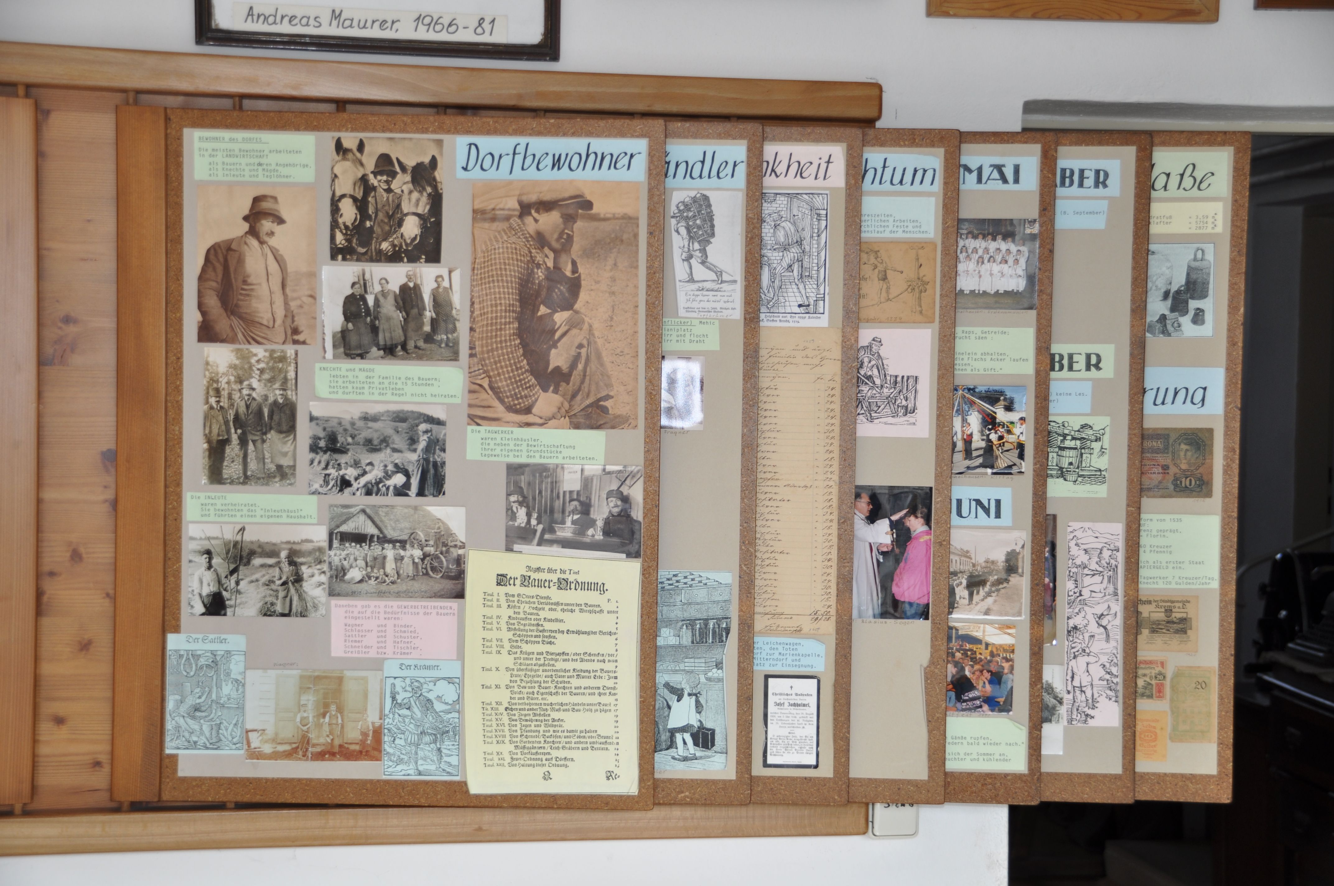 Exhibition panels in the Michelhausen local history museum with historical photos and texts.