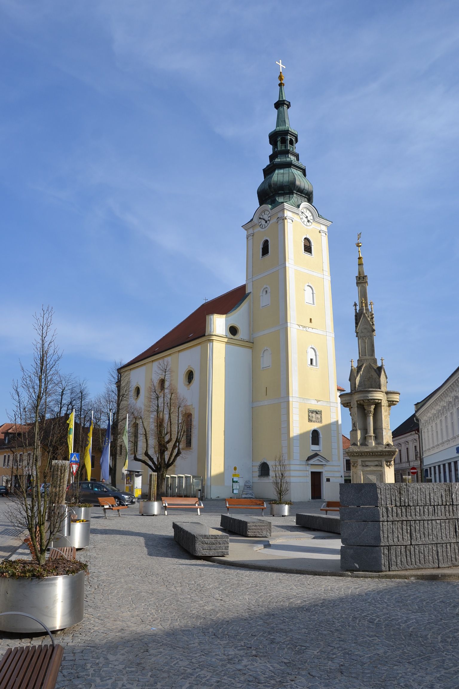 Church with tower and square in Gföhl, Austria.