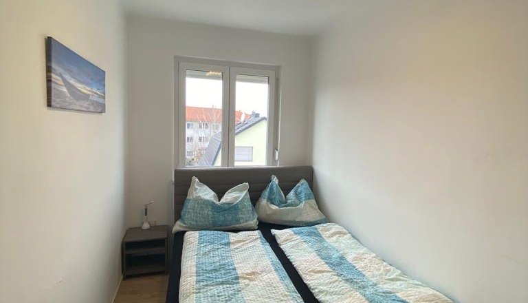 Bedroom with double bed and window