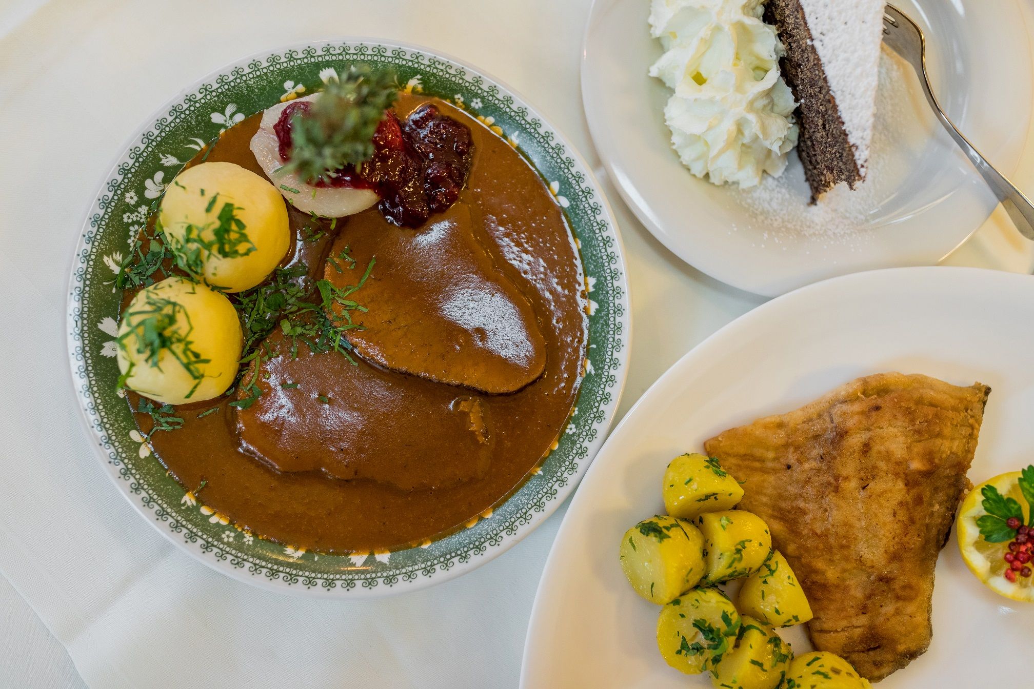 Traditional Austrian dish with meat, dumplings, potatoes and cake.
