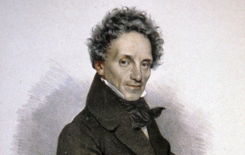 Portrait of a man in historical clothing with curly hair.