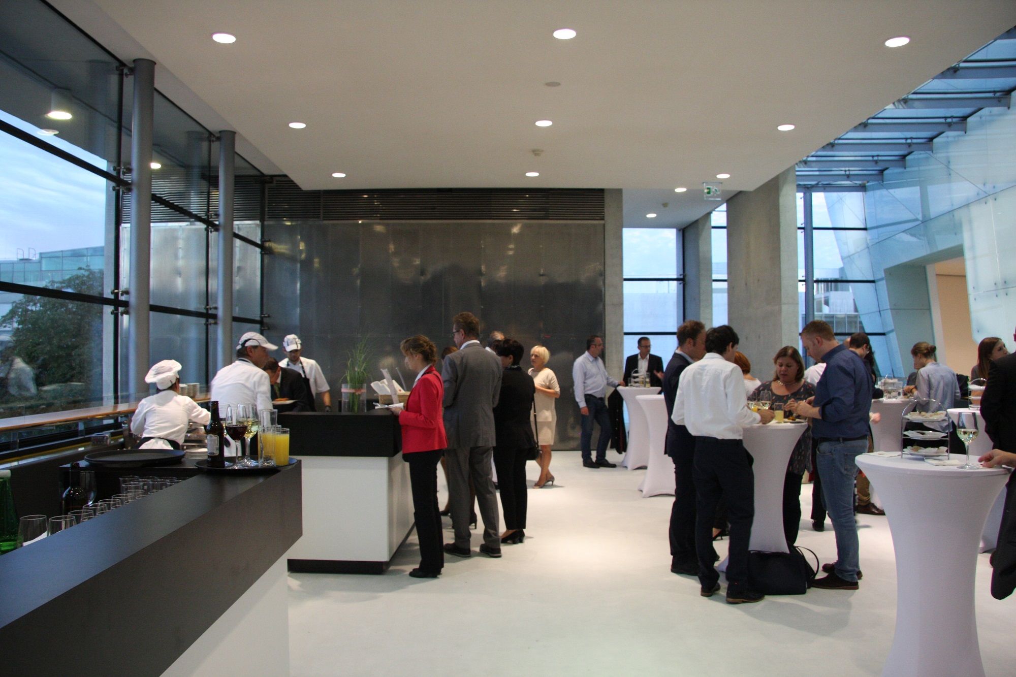 People at a reception in the Festspielhaus St. Pölten.