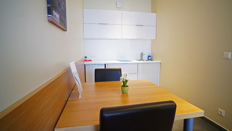 Kitchen with dining area, © Nava Motel