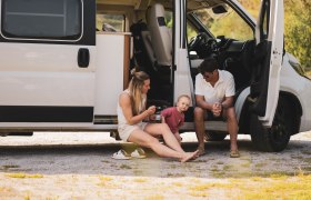 Family with a camper van