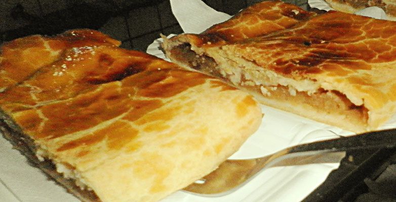 Close-up of apple strudel on a plate with fork.