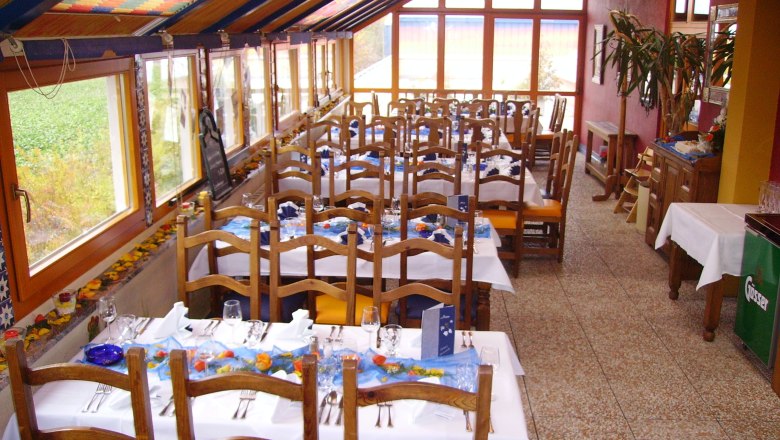 Dining room at Restaurant Treno Orth an der Donau, set tables