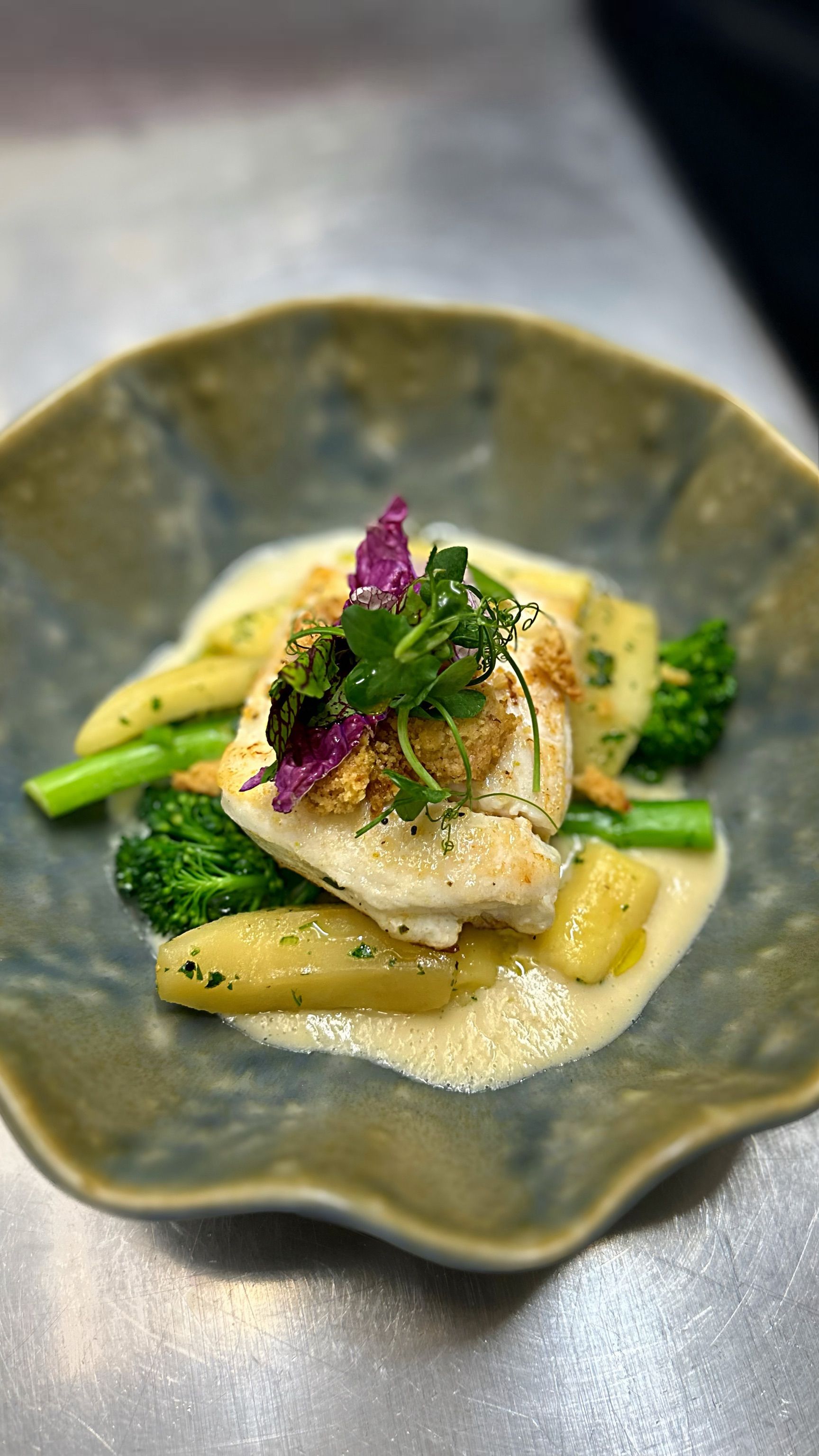 Halibut with gnocchi, stewed apple & walnut crumble on celery beurre blanc