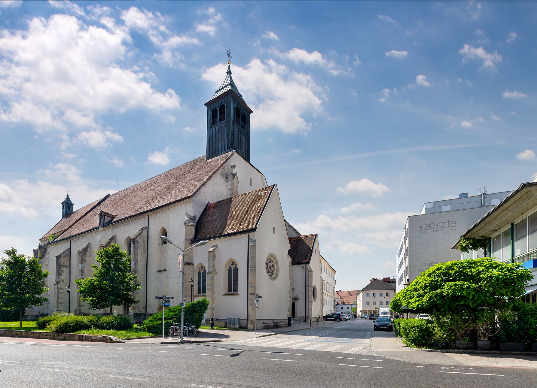 Neukloster Abbey in an urban setting in sunny weather.