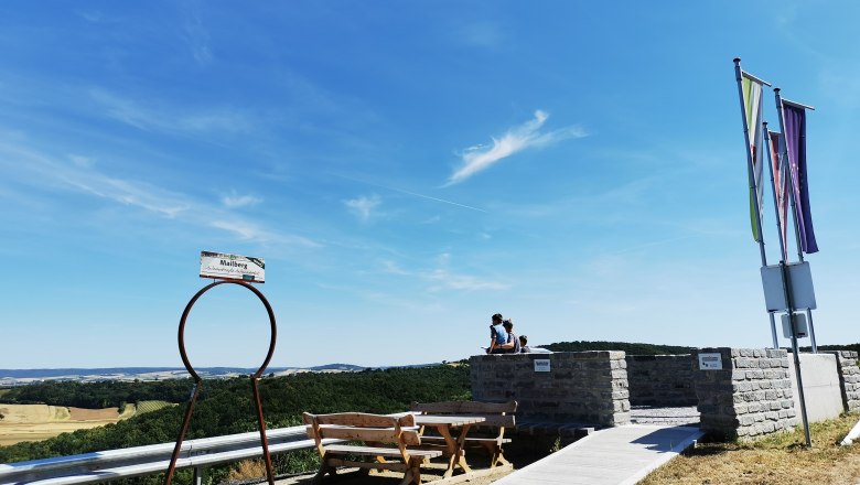 Viewpoint with benches and flags, view of the landscape.