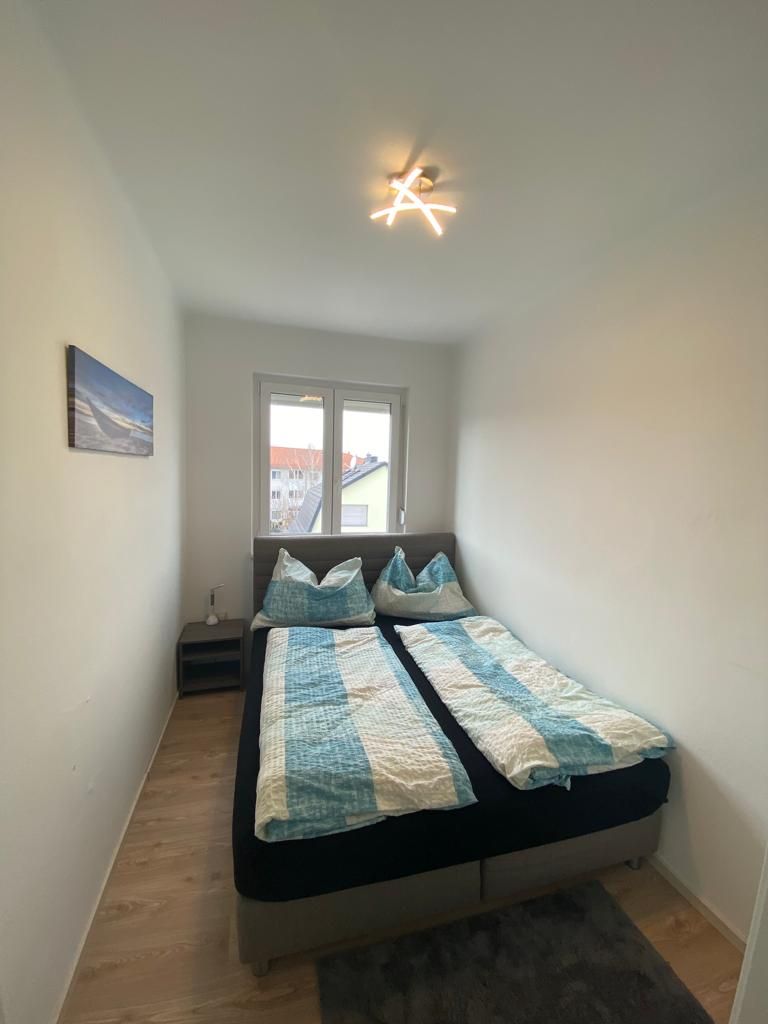 Bedroom with double bed and window