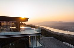 Infinity pool with views of the river and countryside.