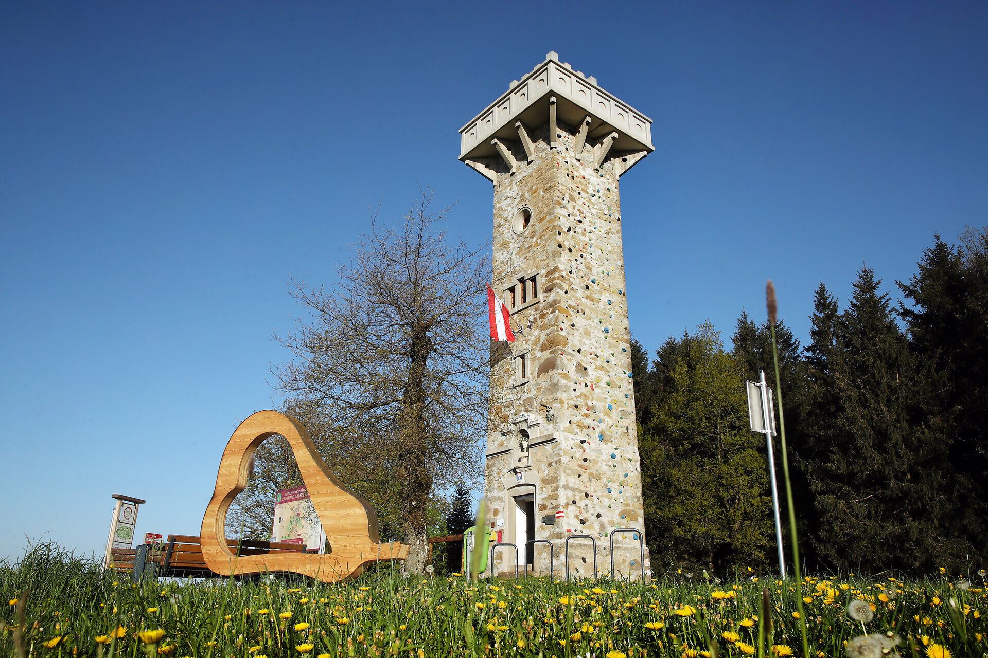Observation tower in a rural hilly landscape.