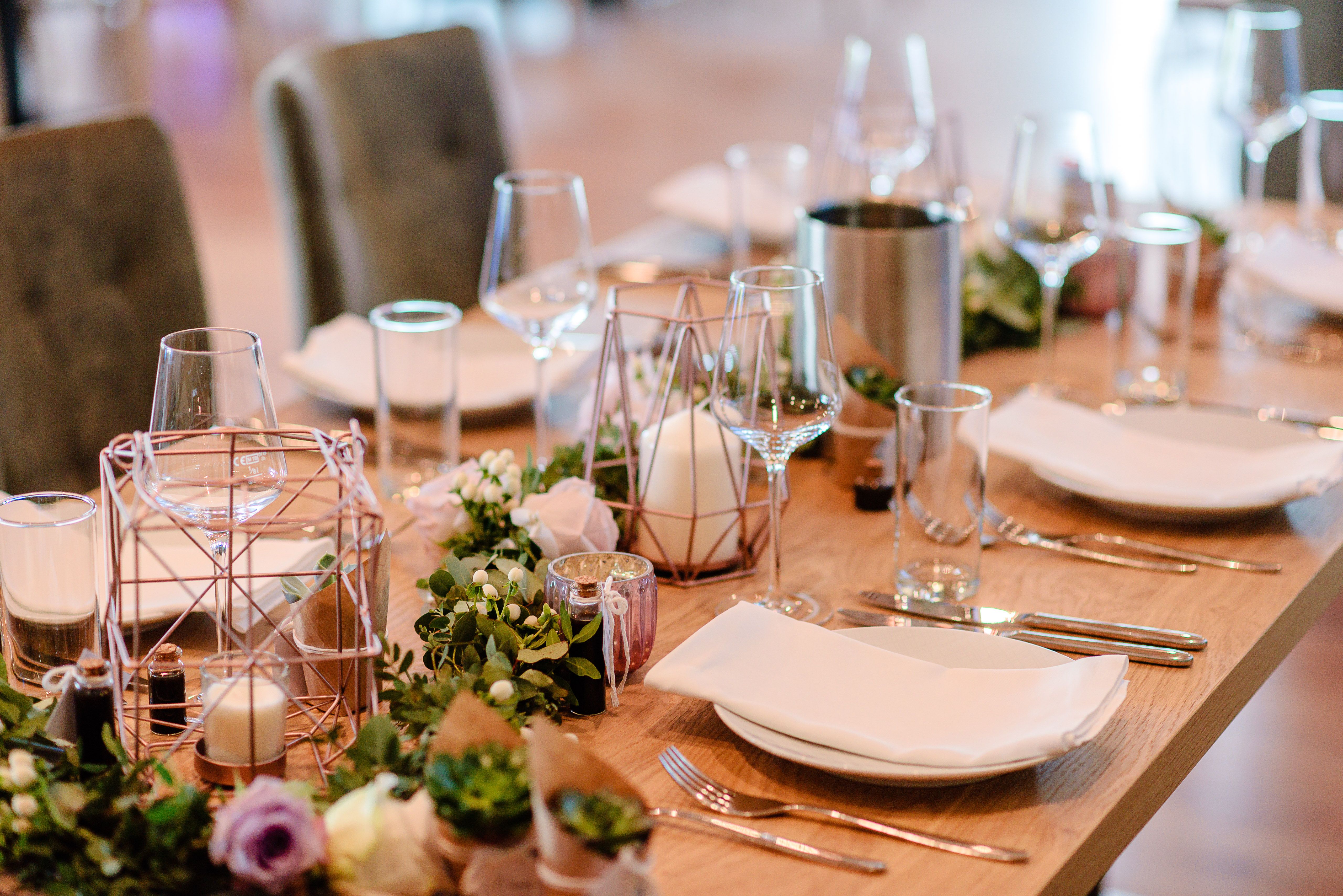 Elegant wedding table with flowers and candles.