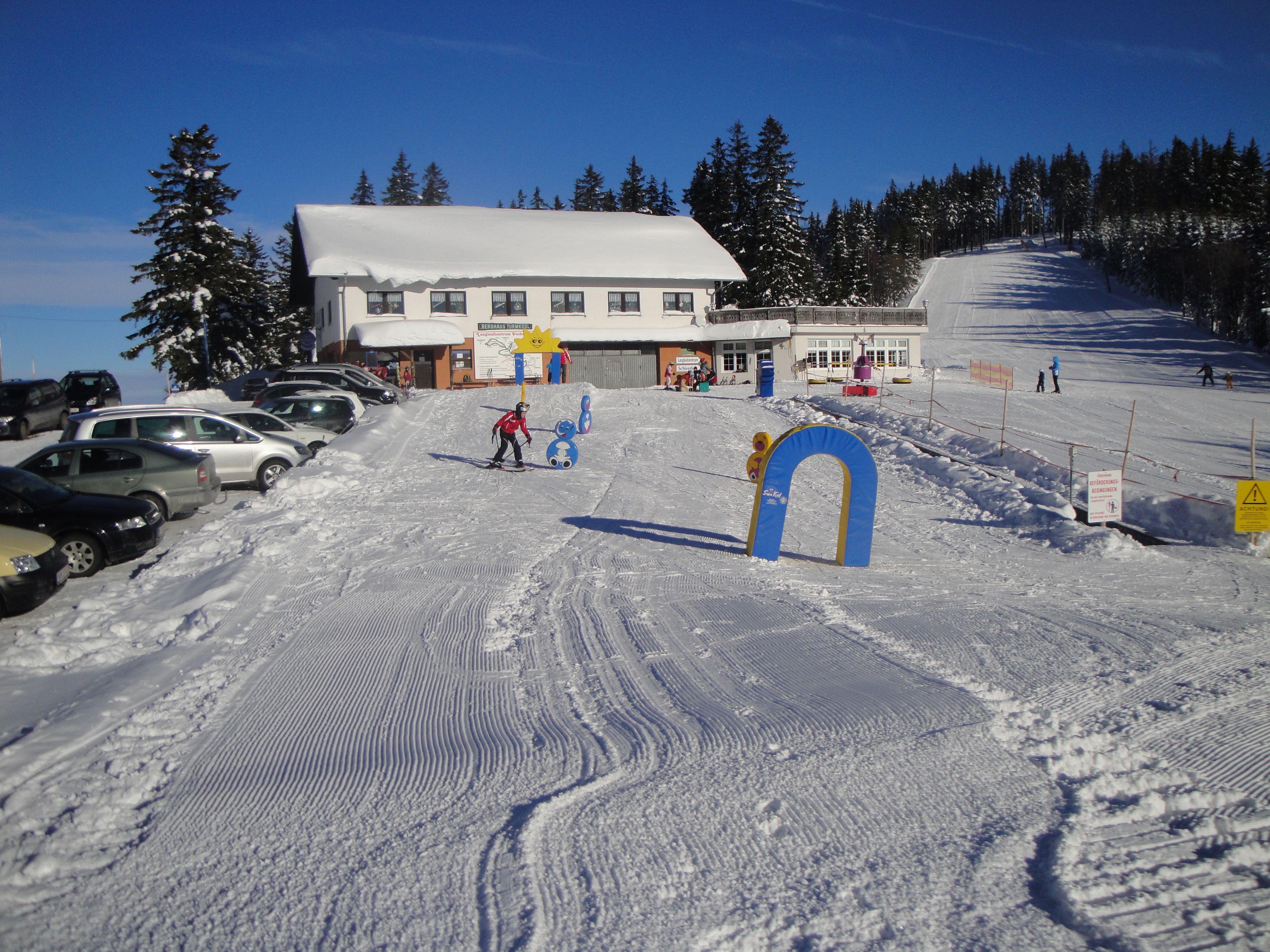 Winter landscape with ski lift and building in Puchenstuben.
