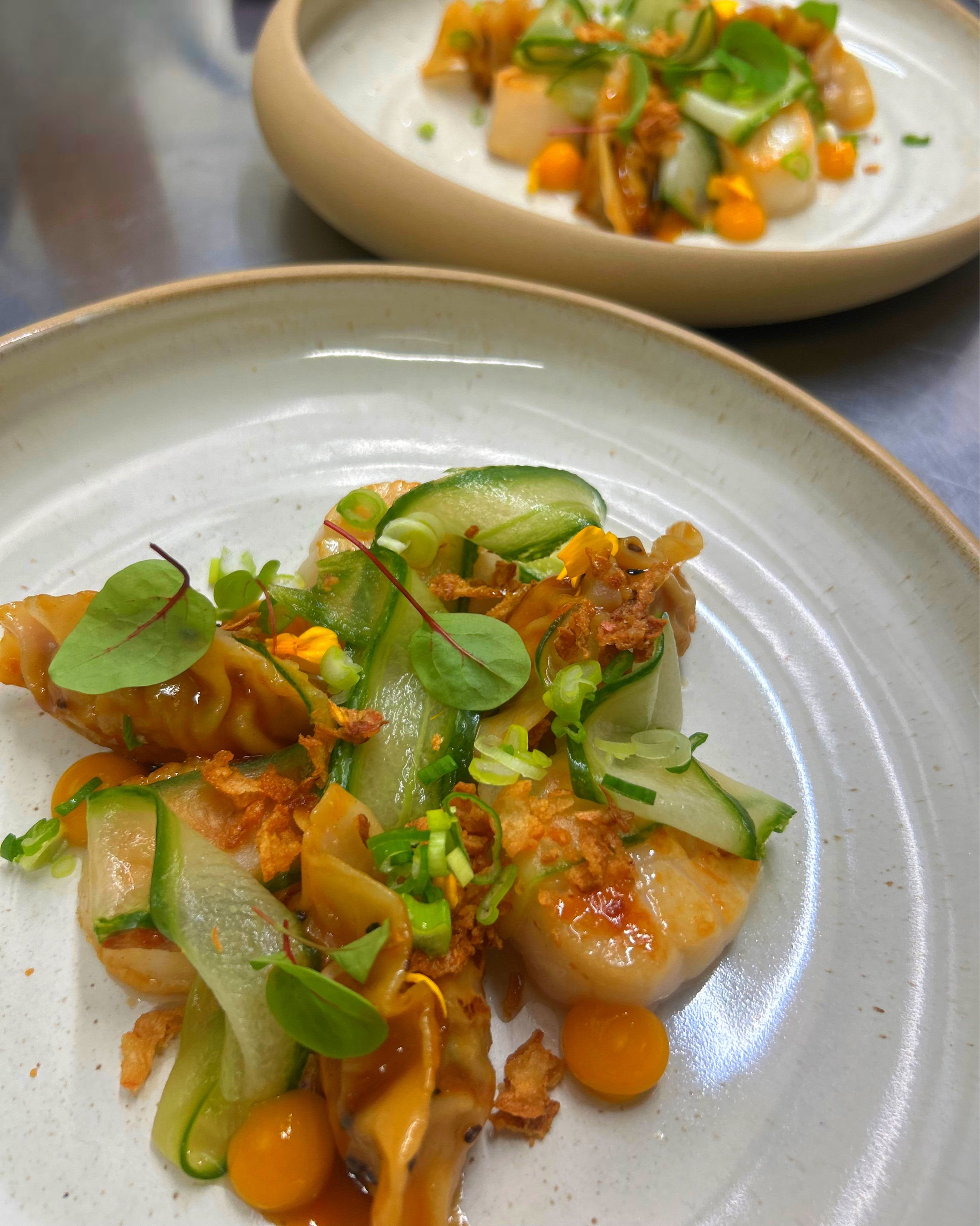 Pork & scallop gyoza, apricot sweet`n spicy, cucumber asazuke, fried onions