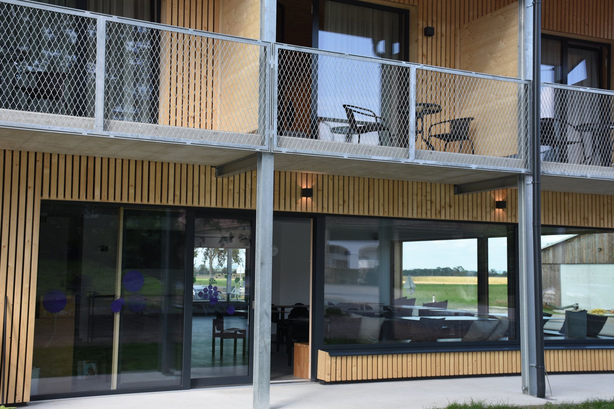 Entrance to the terrace and the balconies above.