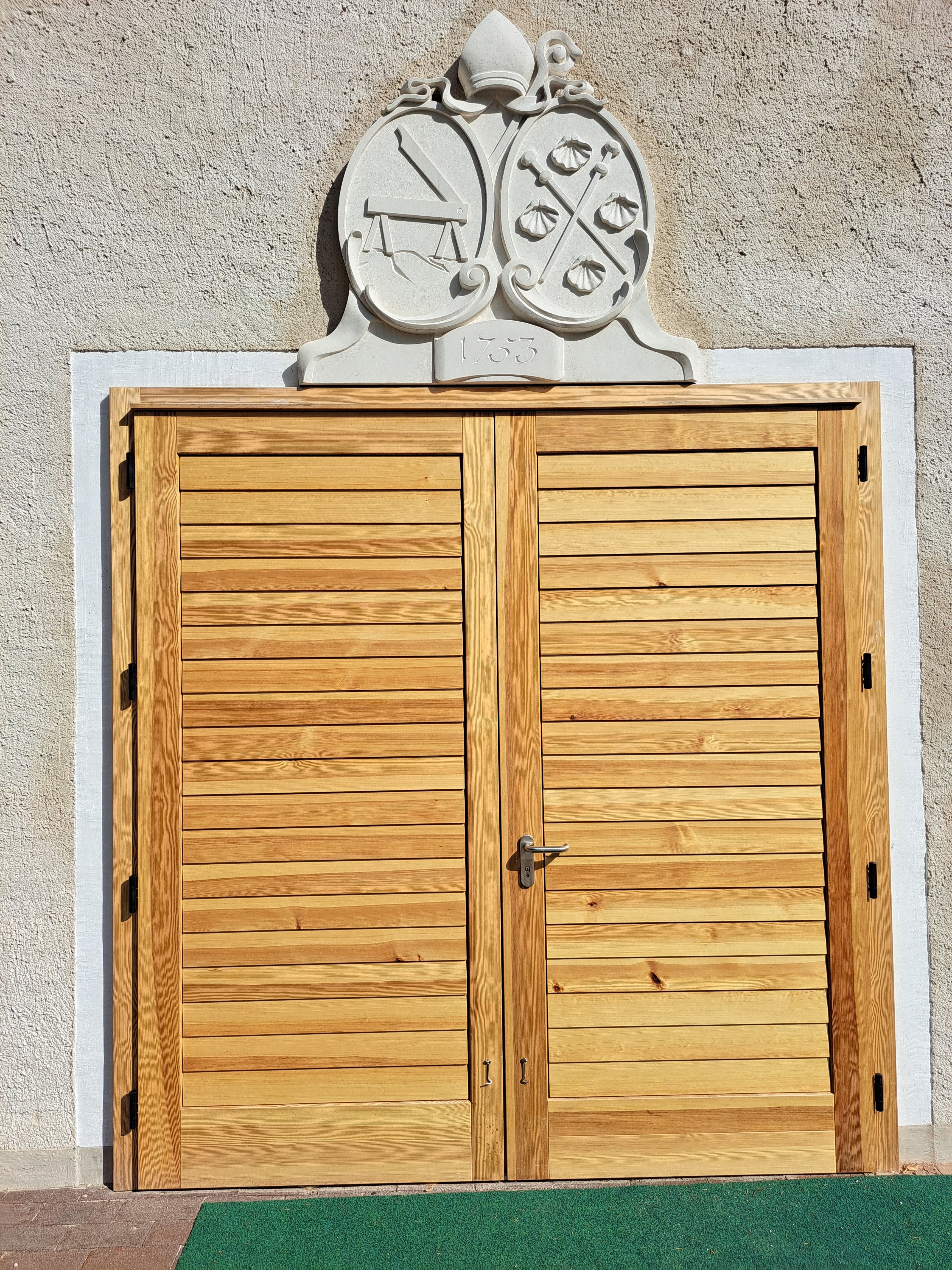 Main entrance with coat of arms of Abbot Jacob Pach (1753)