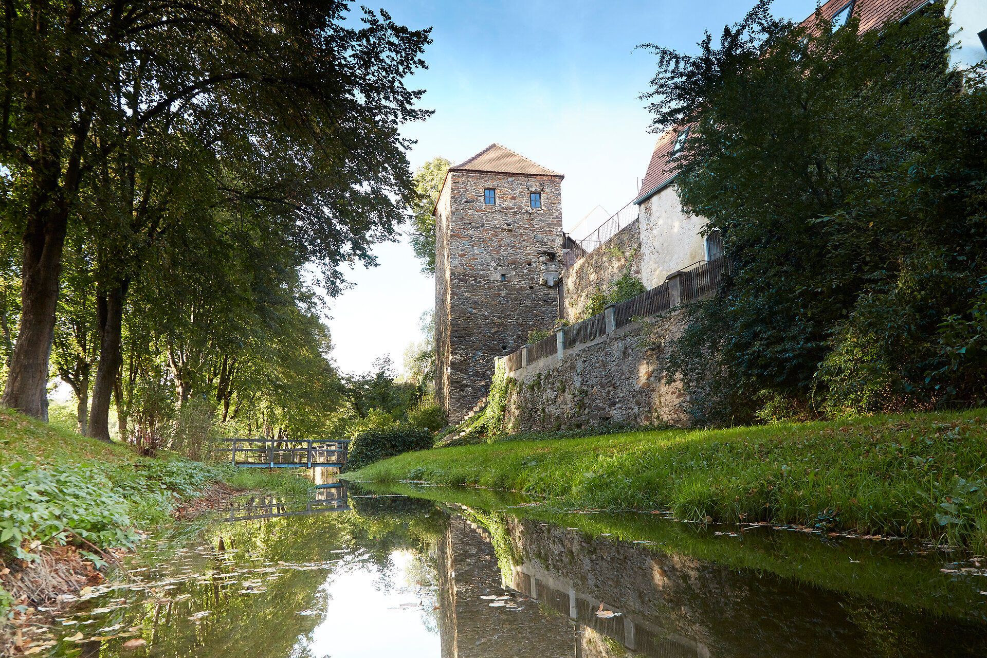 Zwettl town wall with tower and moat.