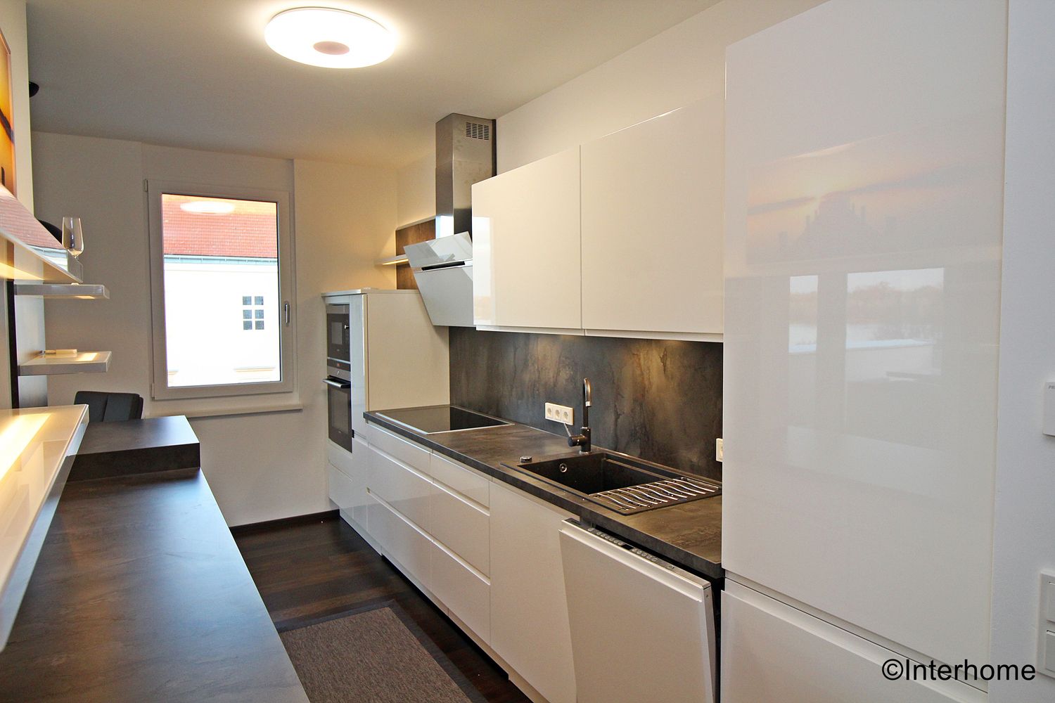 Kitchen with electrical appliances and window 