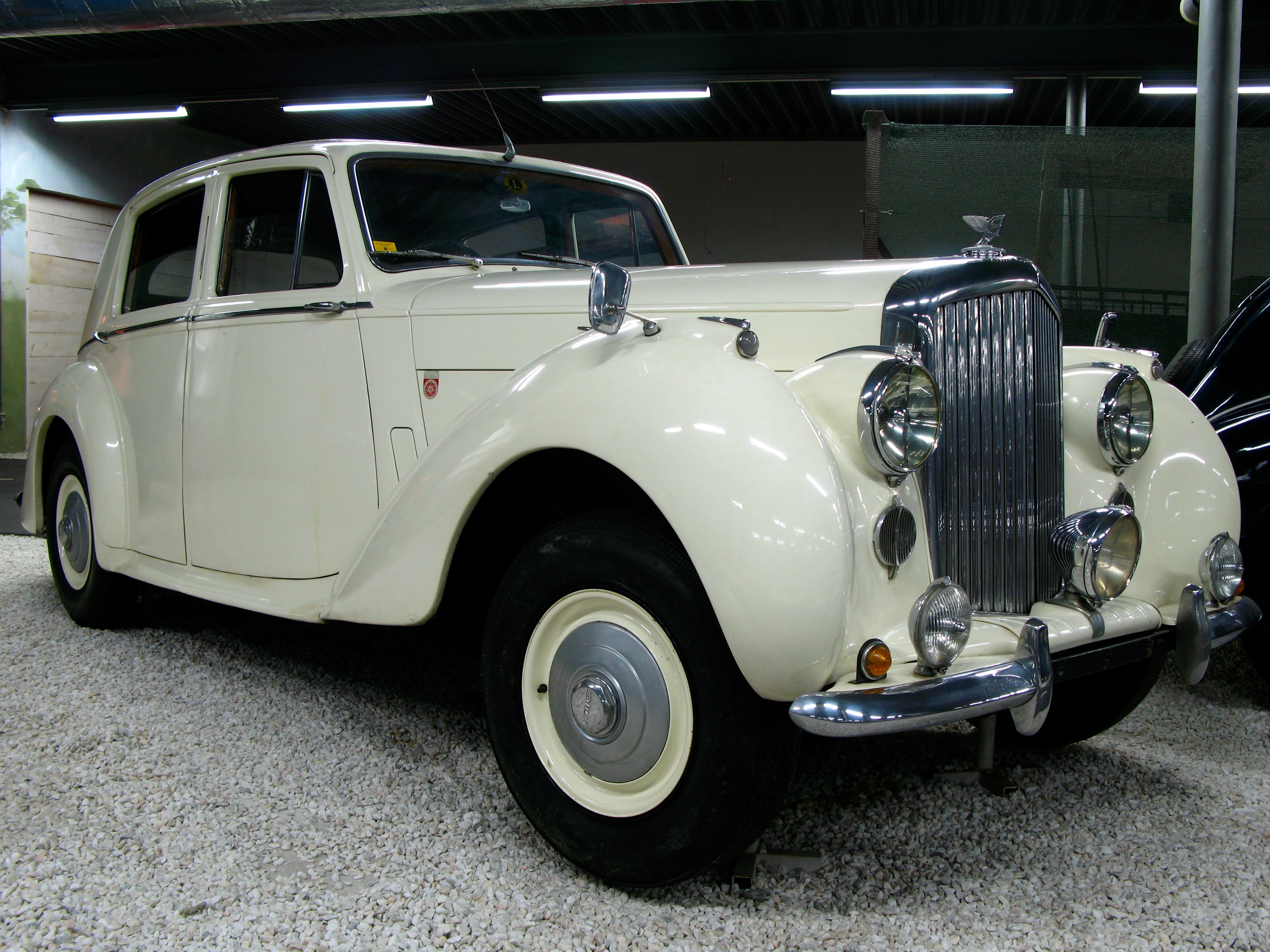 A white vintage car in the Aspang automobile museum.
