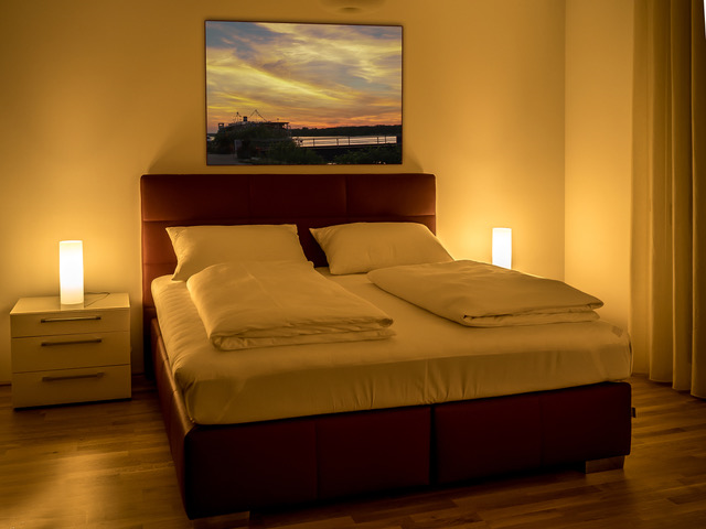 A cozy bedroom with double bed 