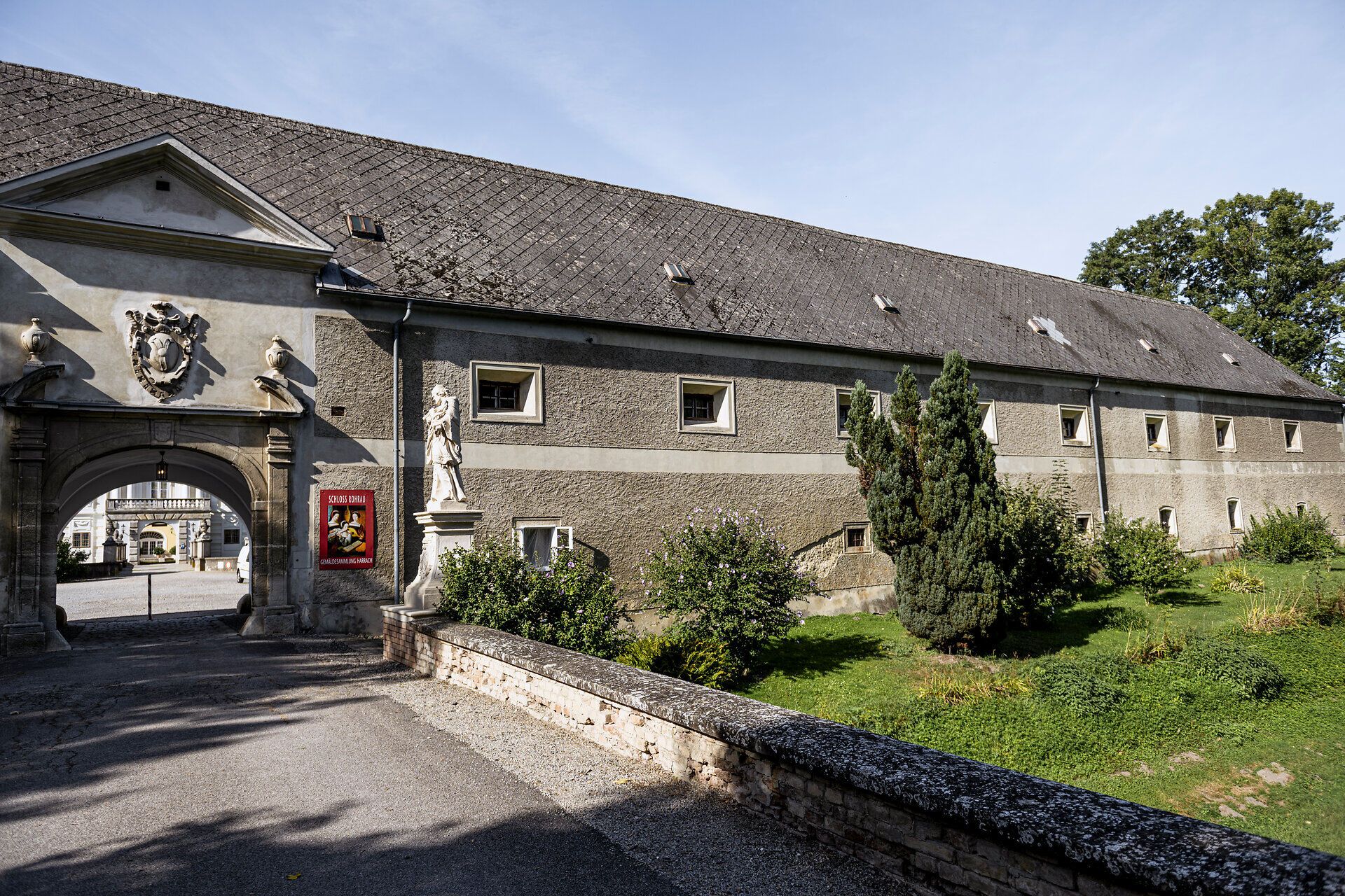 Bridge and view of the inner courtyard of Rohrau Castle. 