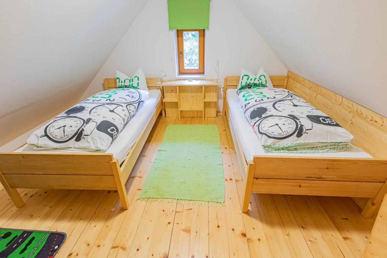 Room with two single beds