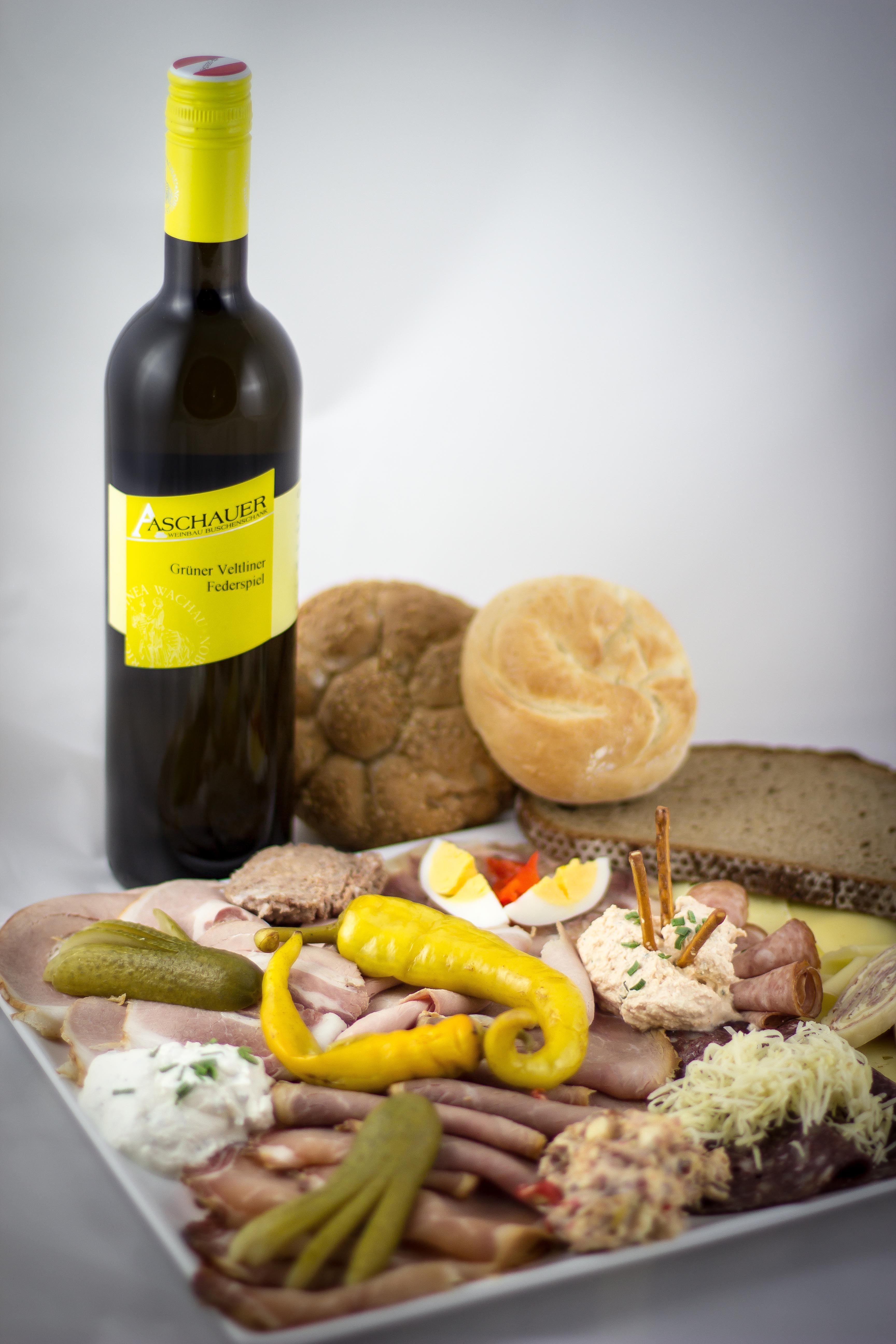 Snack and home-made wine at the Aschauer wine tavern