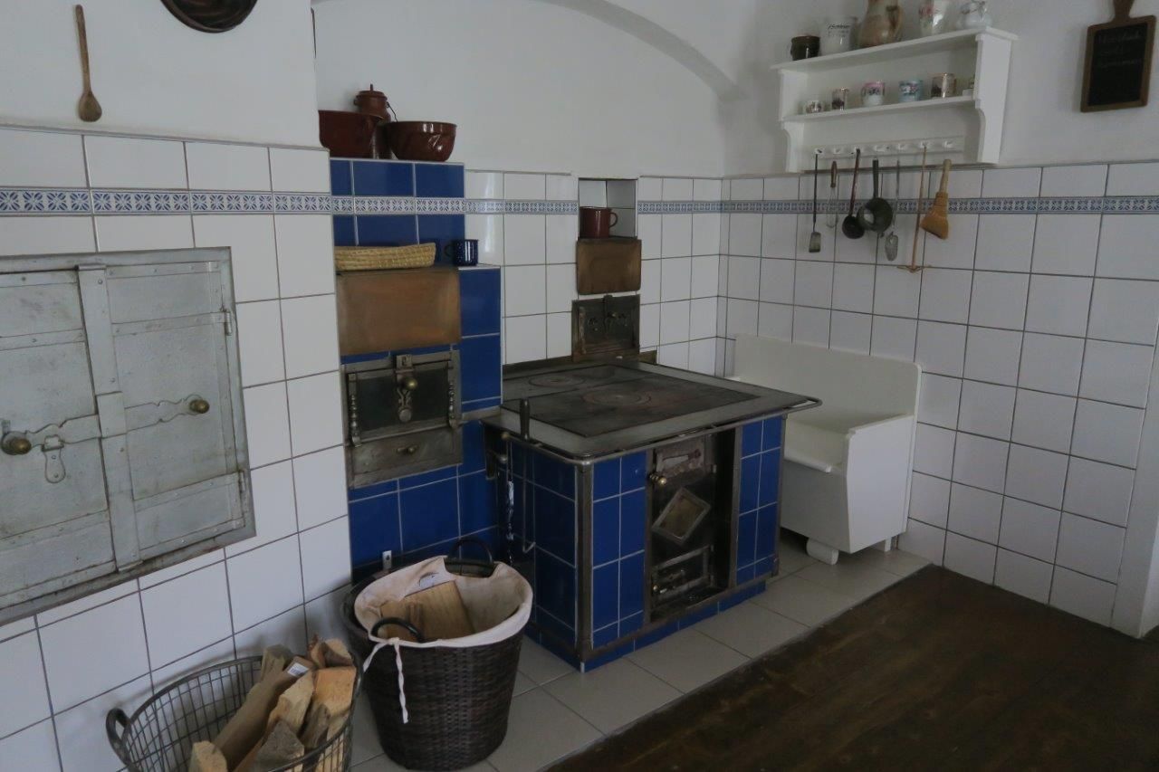 Vacation home Dörrmühle- kitchen with wood stove