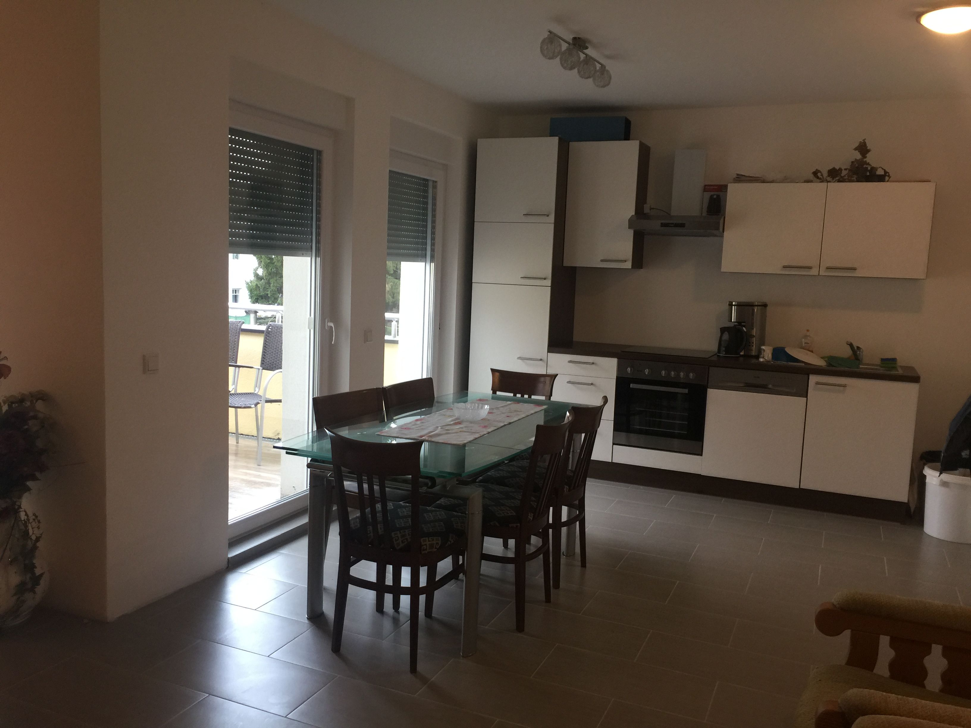 Shared kitchen with dining table 