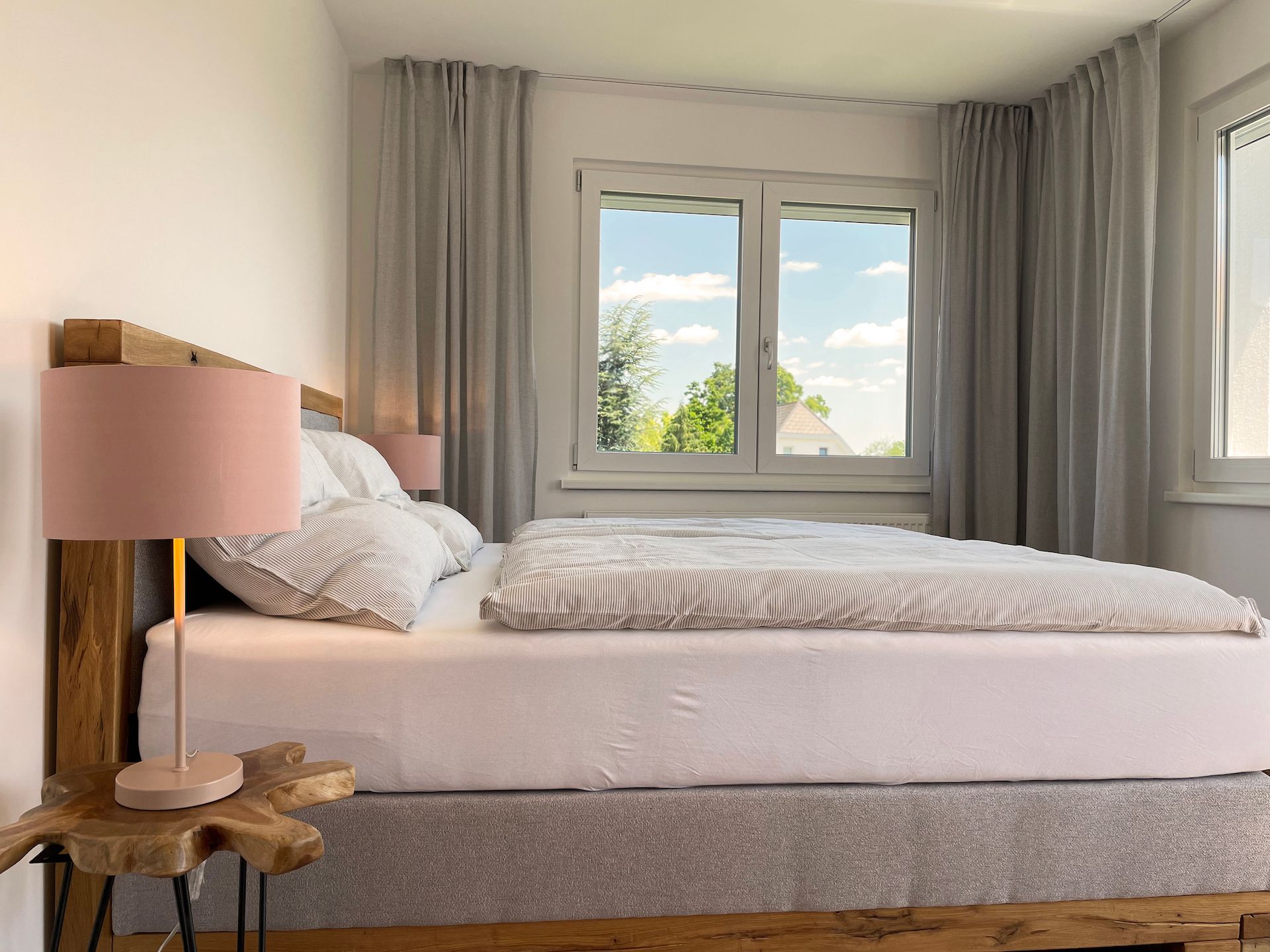 Box-spring bed in bedroom 1