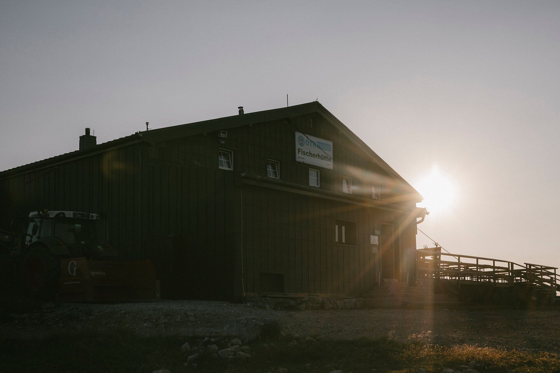 A fisherman's cabin on Schneeberg bathed in the warm light of the low-hanging sun