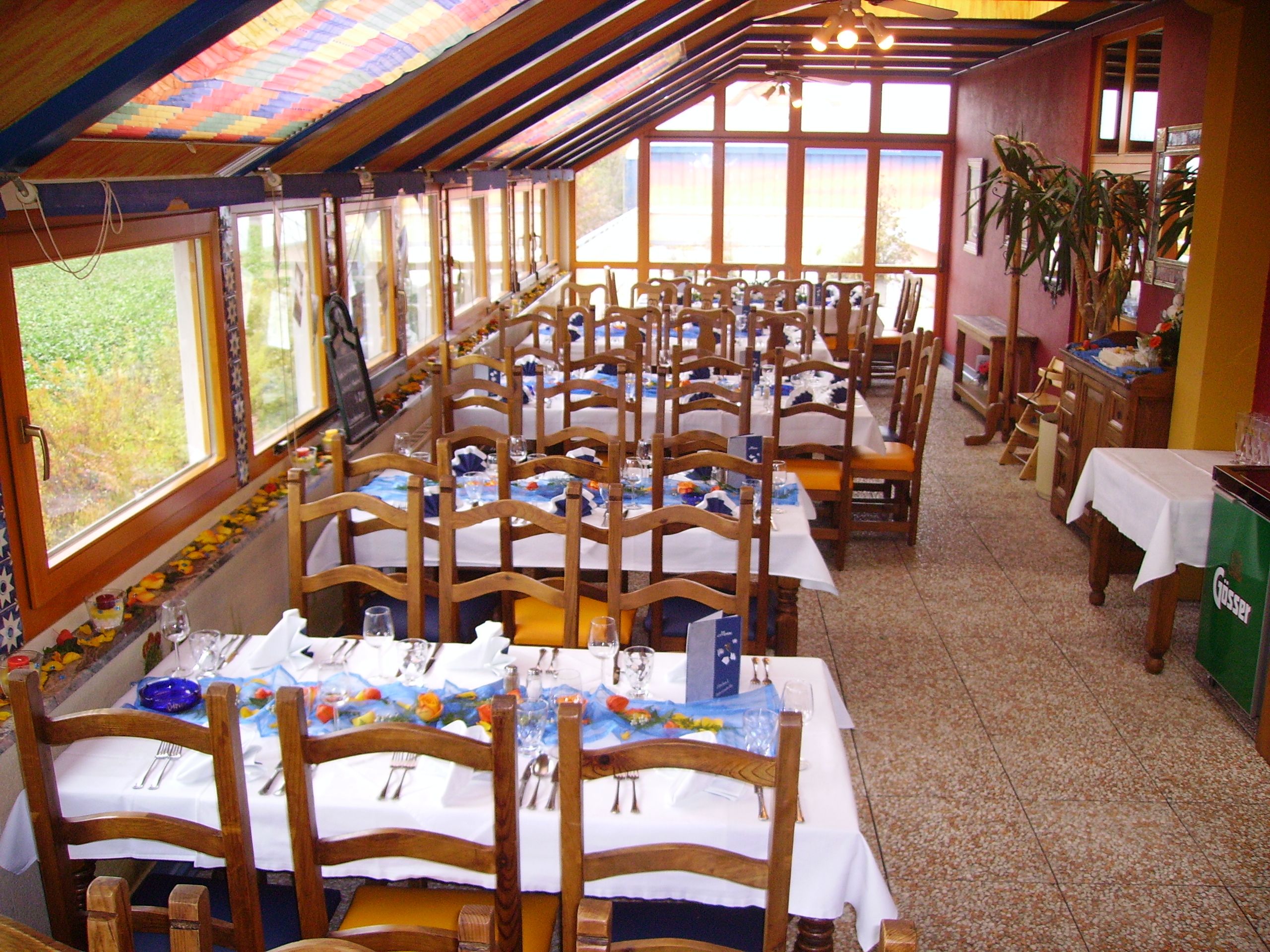 Dining room at Restaurant Treno Orth an der Donau, set tables