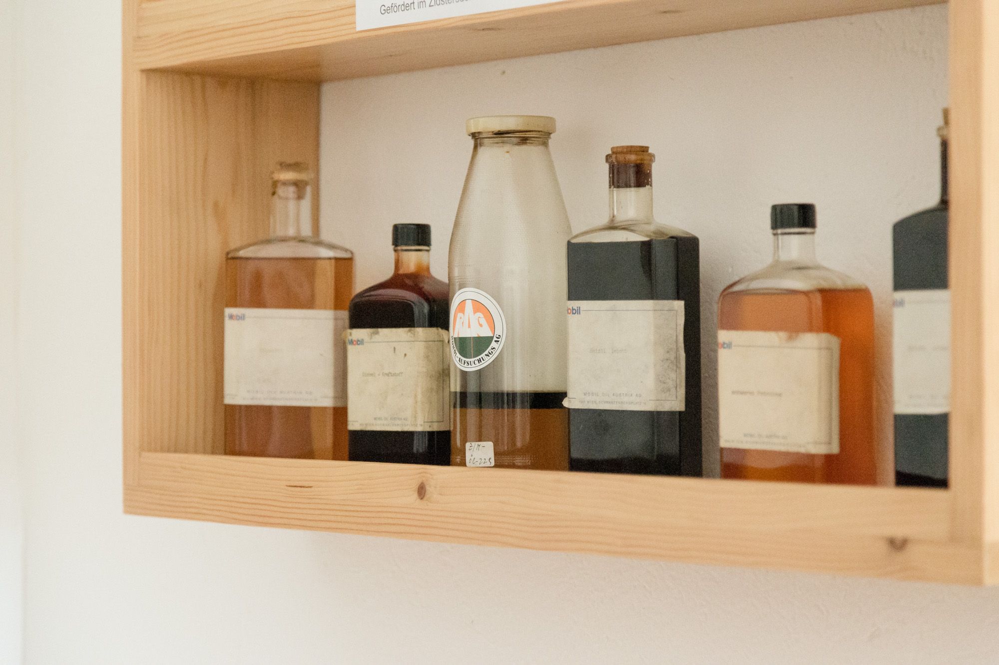 Shelf with old bottles in the Zistersdorf town museum.