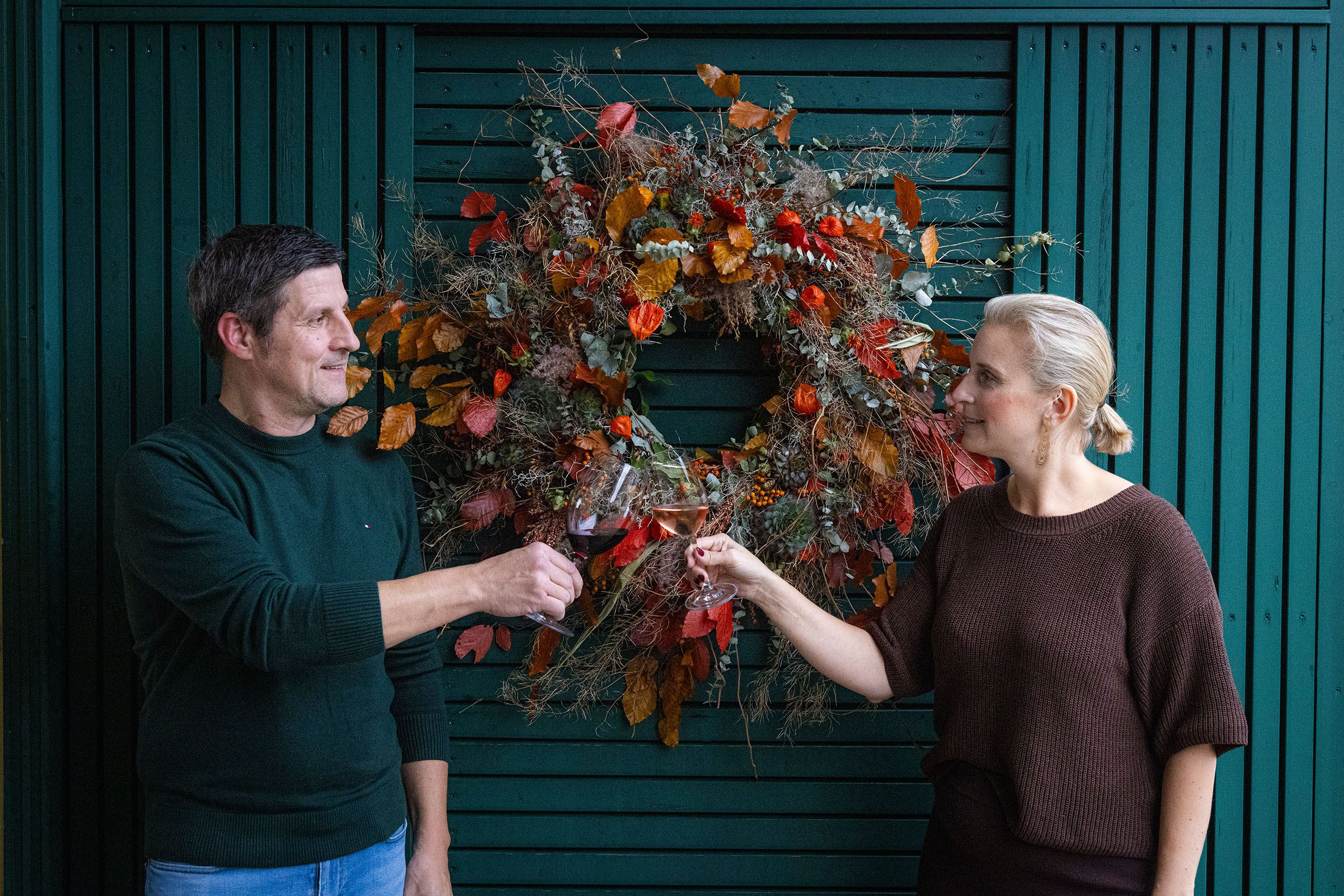 The owners of the winery at the entrance portal