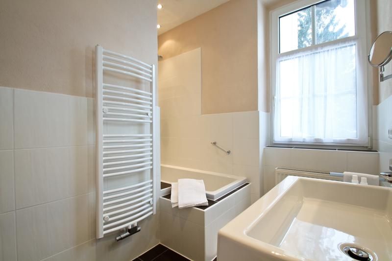 Light-flooded bathrooms in living-style design