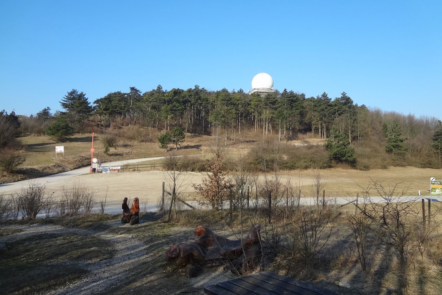 Landscape with hills, forest and radar dome on the Buschberg.