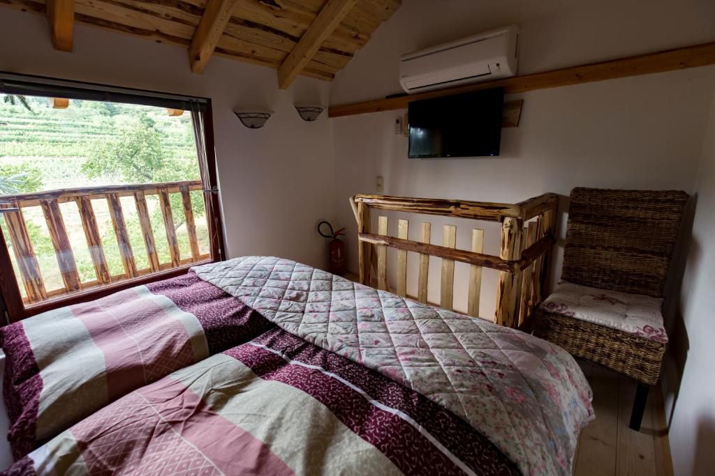 Double bed with colorful bed linen