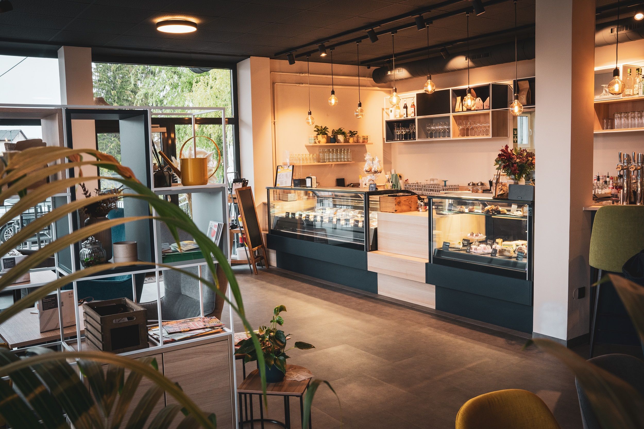 Counter of the café with many pastries.
