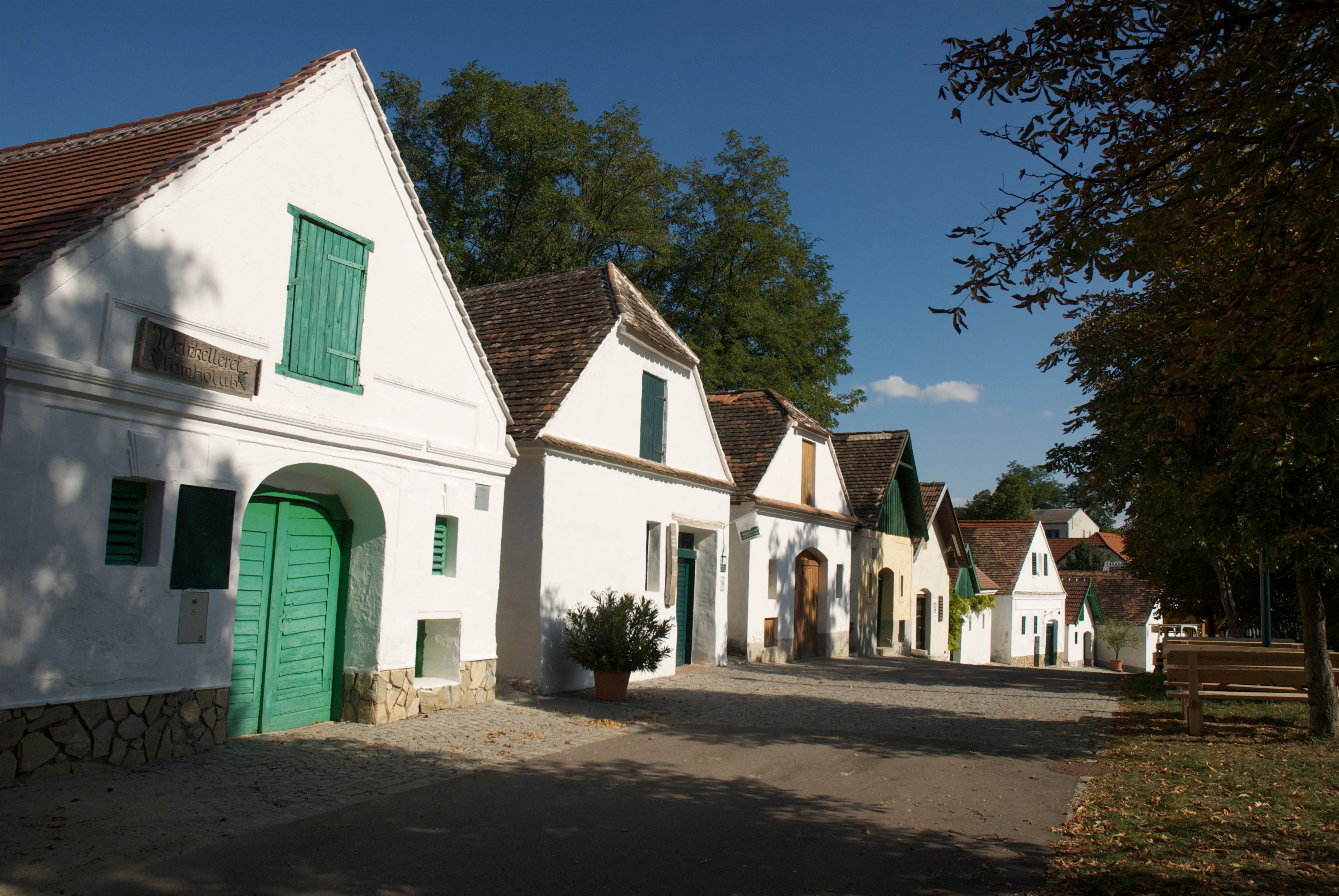Row of traditional wine cellars in Mailberg, Austria, in sunny weather.