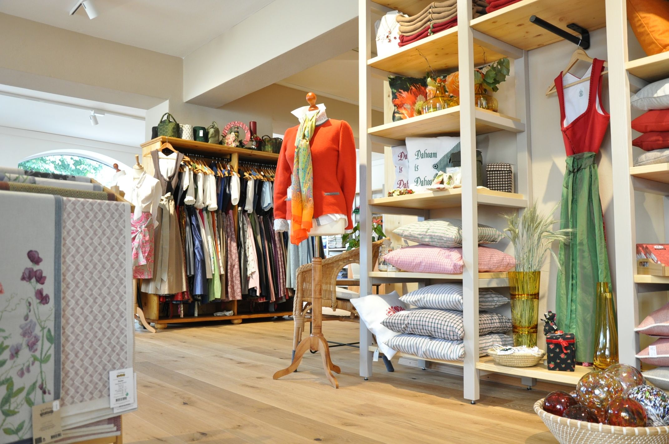Interior view of a store selling traditional clothing and home textiles.