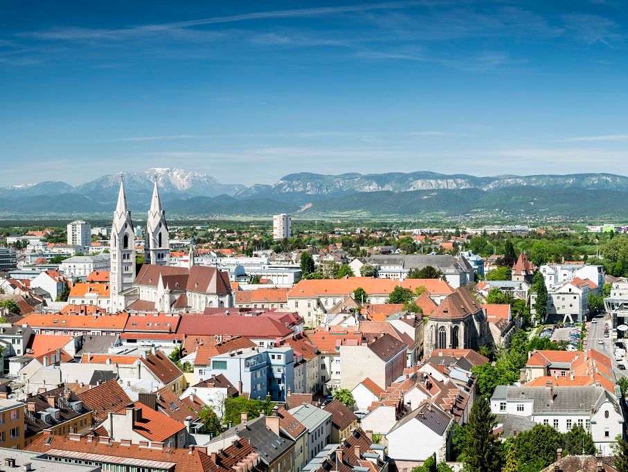 Panorama of Wiener Neustadt with mountains in the background.