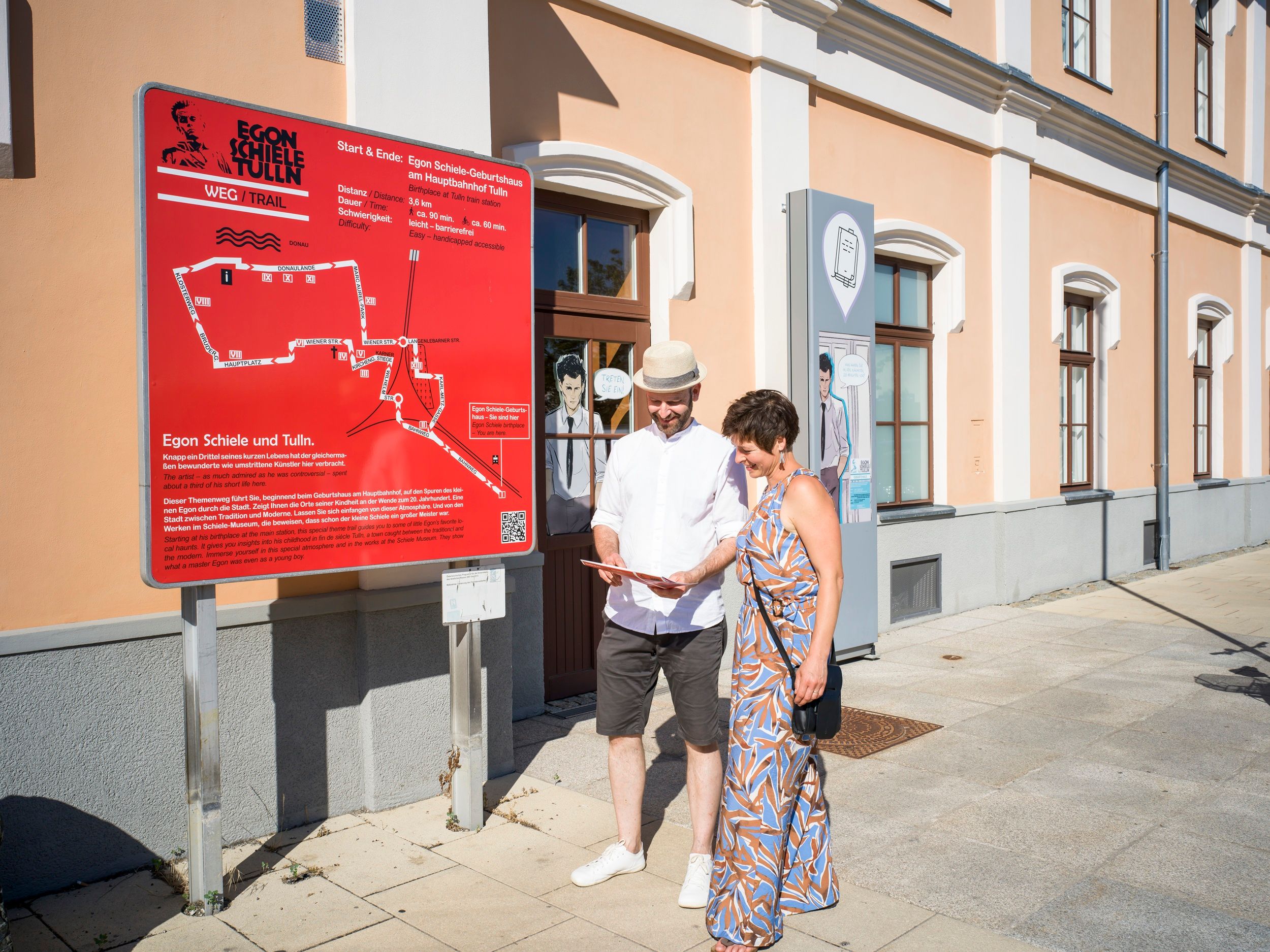 Couple at the entrance to Egon Schiele's Birthplace 