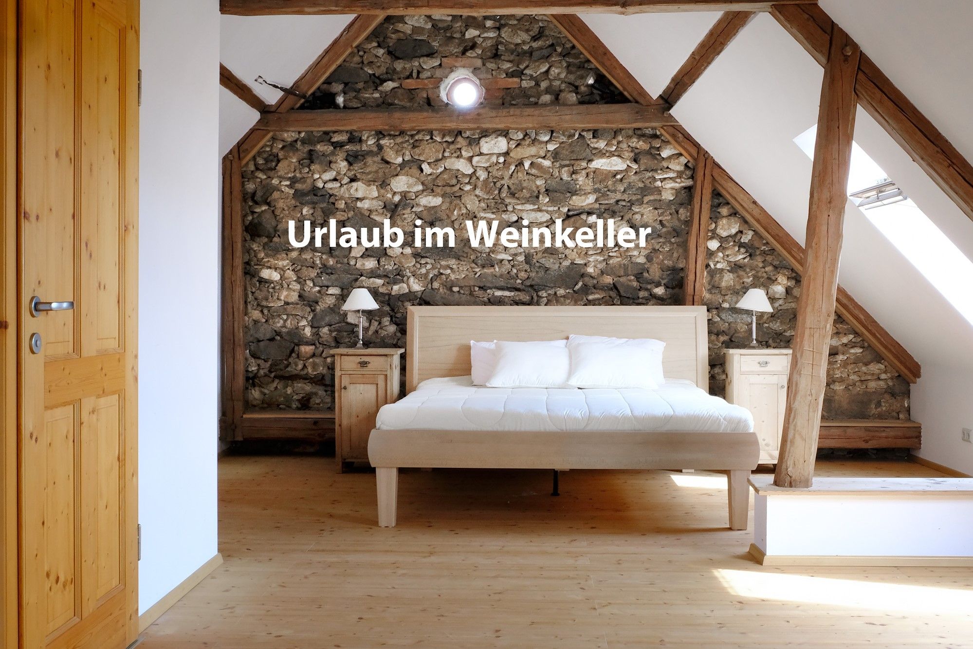 Bedroom with wooden beams and stone wall, bed in the middle, text 'Vacation in the wine cellar'.