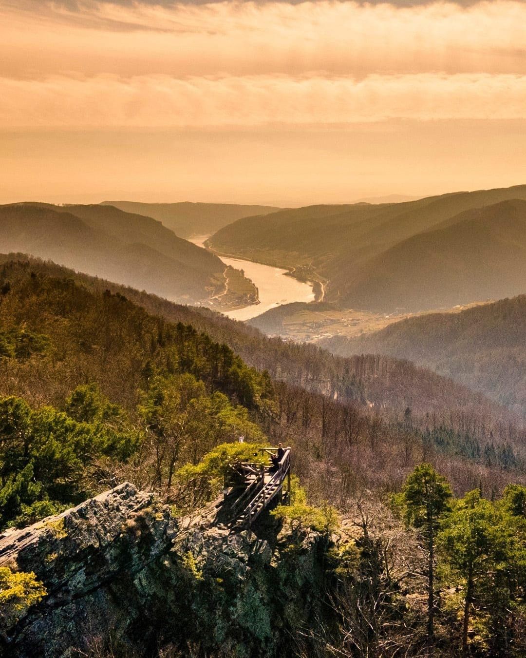 View of a river valley at sunset from the Buschandlwand.