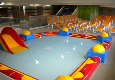 Toddler pool with slide in the Oberndorf family pool.